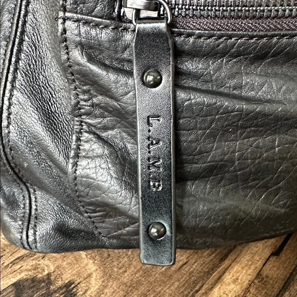 L.A.M.B. Black Leather Bucket Backpack - Picture 2 of 14